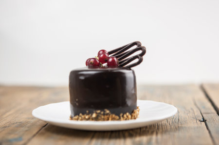 Tasty chocolate cake on table