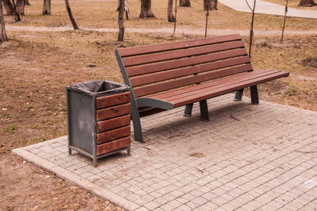 Bench in the park among the treesの写真素材