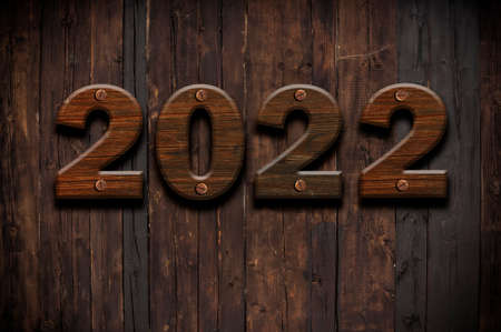 2022 Happy New Year seasonal background with real wood background. Aged parquet of pine wood for...