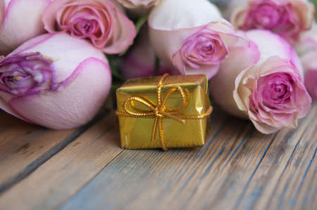 Pink roses on wood background. Mothers day roses, Bouquet of pink roses, Floral background image with copy space for textの写真素材