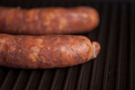 Home sausage fried on home electric grill