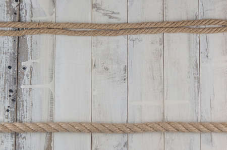 Image of old texture of white wooden boards with ship rope.の写真素材