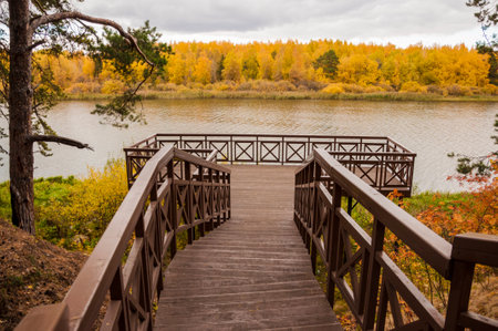 Nice autumn landscape with lakeの写真素材