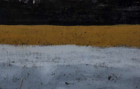 Old yellow metallic sheet with paint stains, grunge background or texture