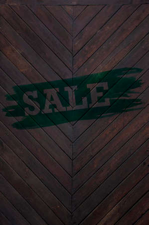 Marketing message of black friday sale on wooden wall with scratches and cracksの写真素材