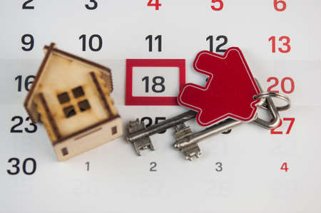 Day of buying or selling a house. Day of payment for rent or loan. Calendar and house. It's time to insure your house. Empty space for text. Mortgageの写真素材