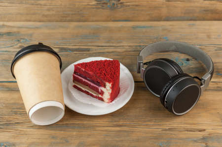 Coffee cup paper and Biscuits on wood table background.の写真素材