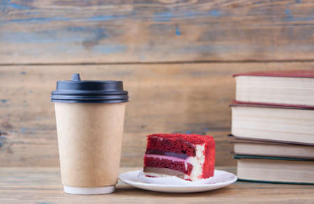 Coffee cup paper and Biscuits on wood table background.の写真素材