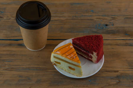Coffee cup paper and Biscuits on wood table background.の写真素材