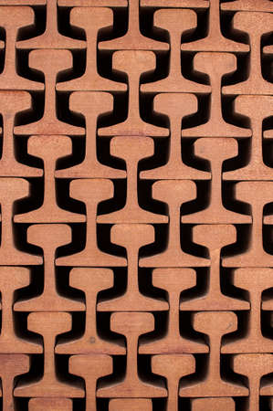 Pile of rusty grooved rails for tram tracks.