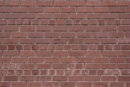 Old brick wall with shadow texture can be used as backgroundの写真素材