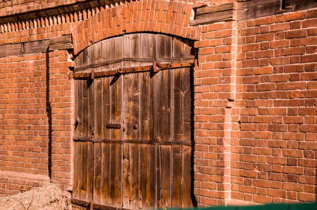 Entrance of house with beautiful very old wooden gatesの写真素材