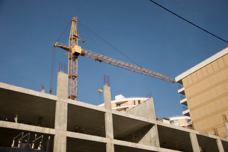 The foundation on reinforced concrete piles and the frame during the construction of a multi-storey building.の写真素材