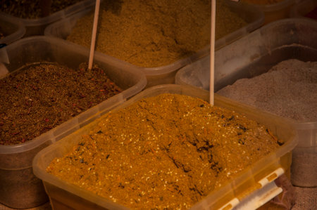 Piles of Spices and Herbs at Spice Marketの写真素材