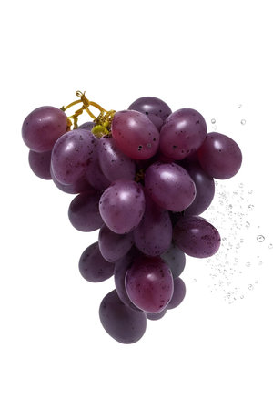 Bunch of grapes with water splashes isolated on white background.の素材