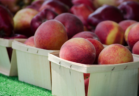 ripe juicy michigan peaches  for saleの写真素材
