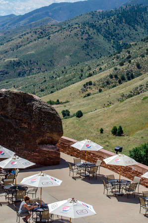 Red Rocks, Morrison Colorado: outdoor seating at the caf? inside Red Rocks Amphitheatre, provides amazing views of the dramatic mountains and breathtaking sceneryのeditorial素材