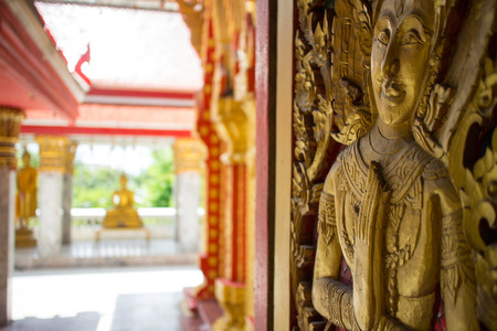 buddha carving door in the templeの写真素材