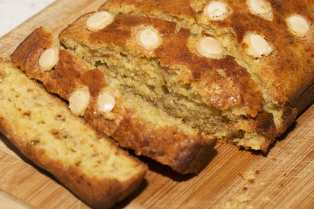 Banana bread with white chocolate flakes topping