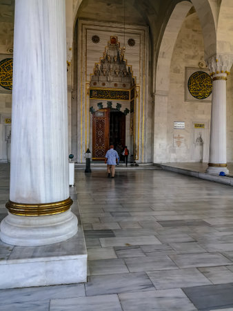Turkey, Ankara - October 23, 2019: Entrance to Melike Hatun Mosque in Ankara, close-up. Facade of a Muslim religious building with columns and walls of white marble, outside view, verticalのeditorial素材