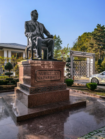 Turkey, Ankara - October 23, 2019: Nursultan Nazarbayev monument in Ankara. Statue of a Kazakh politician sitting in a chair on a sunny autumn dayのeditorial素材