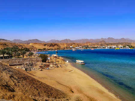 View of Sharm El-Maya Bay in Sharm El Sheikh (Egypt). Beautiful exotic landscape of the Red Sea among sandy mountains and hillsの写真素材