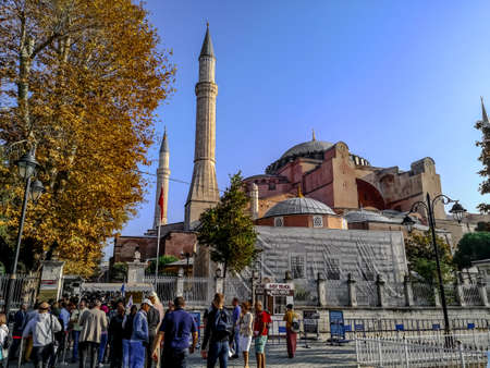 Istanbul, Turkey - October 29, 2019: Tourists queue at the entrance to Hagia Sophia in Istanbul. Many people on the street against the background of the Turkish landmarkのeditorial素材