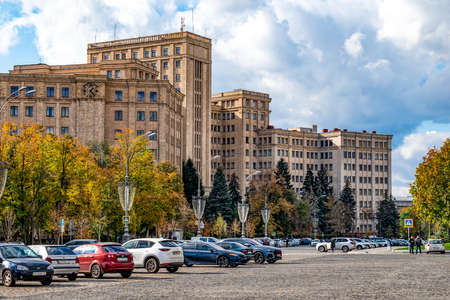 Kharkiv, Ukraine - October 20, 2020: View from Freedom Square to the building of V. N. Karazin Kharkiv National University in Kharkov. Beautiful autumn cityscape with many cars and old buildingのeditorial素材
