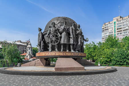 Mykolaiv, Ukraine - July 26, 2020: Monument to Shipbuilders on the city square in Mykolaiv. Old sculptural composition with sailors around a round globeのeditorial素材