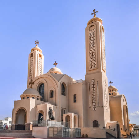 Sharm El Sheikh, Egypt - January 18, 2020: The modern building of the El sama Eyeen Coptic Church against the blue sky in Sharm El Sheikh. Exterior of an Egyptian Orthodox templeのeditorial素材