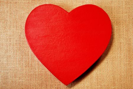 Stock image of hand painted Papier-mâché heart over burlap backgroundの写真素材