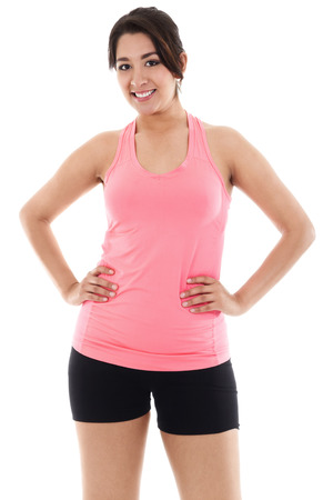 Stock image of smiling woman wearing exercise clothing isolated on white backgroundの写真素材