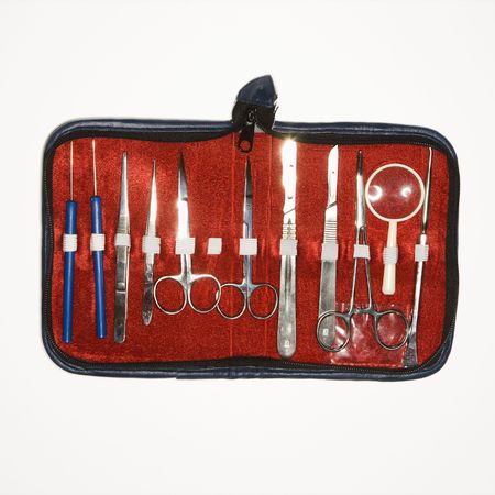 Medical kit with tweezers, scissors, scapel.の写真素材