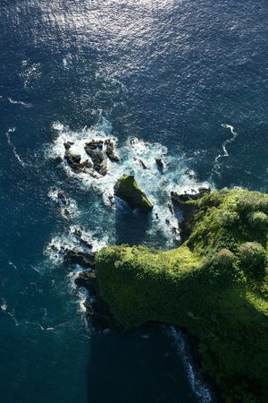 Aerial of rocky coast on Pacific ocean in Maui, Hawaii.の写真素材