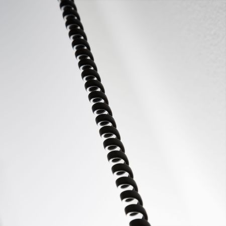 Curly black telephone cord.の写真素材