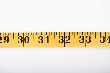 Measuring teape in a straight line. 