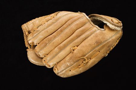 Baseball glove on black.の写真素材