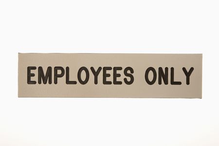 Employees only sign against white background.の写真素材