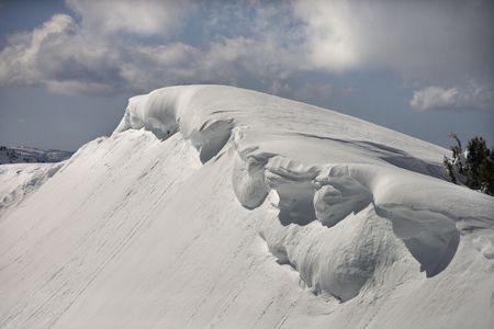 Aerial of snowcapped mountain peak in Crystal Mountains, California, USA.の写真素材