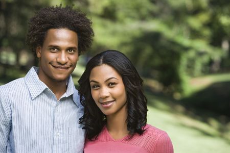 Attractive couple portrait in park.の写真素材