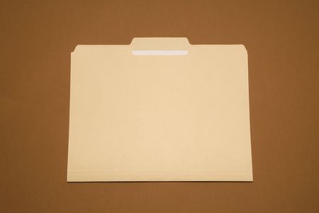 Blank folder on brown blackground.の写真素材
