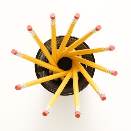 Top view of group of pencils in pencil holder arranged in a spiral shape.の写真素材