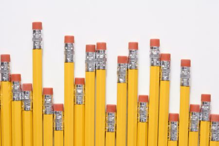Uneven row of eraser ends of pencils.の写真素材