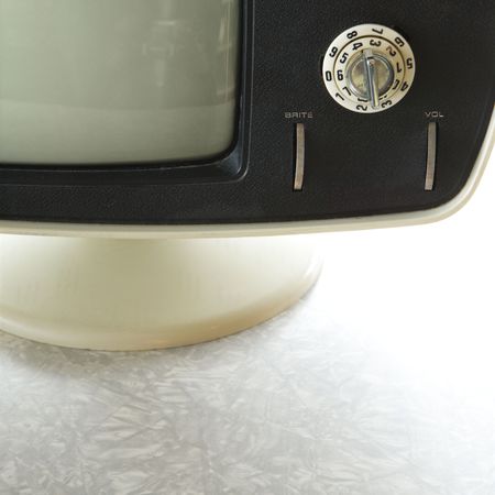 Close-up still life of vintage television set with adjustment knob.の写真素材