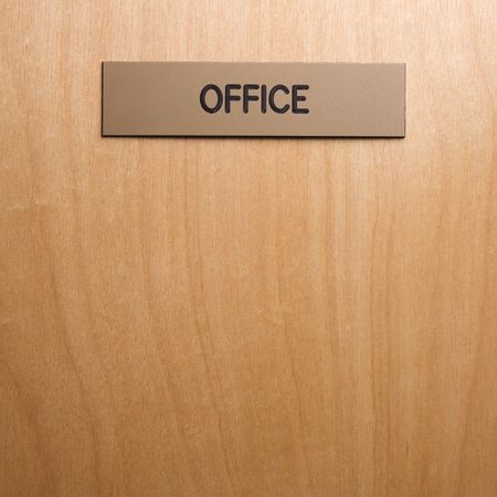 Office sign on wooden door.の写真素材