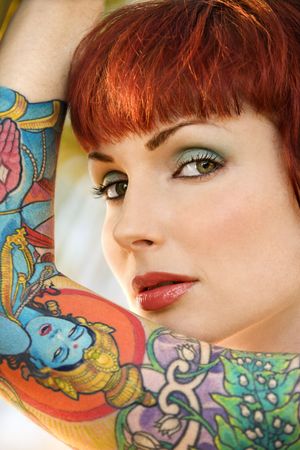 Close up portrait of attractive tattooed Caucasian woman in Maui, Hawaii, USA.の写真素材