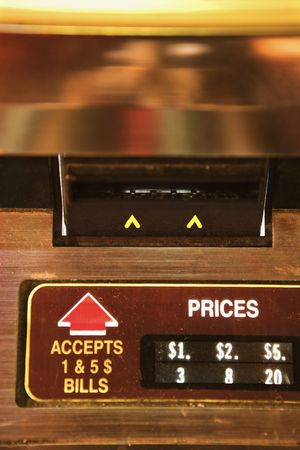 Close-up of money slot on jukebox.の写真素材