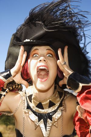 Close up of young adult Caucasian female dressed in pirate costume.の写真素材