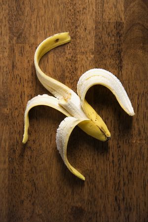 Close up still life of half eaten banana.の写真素材