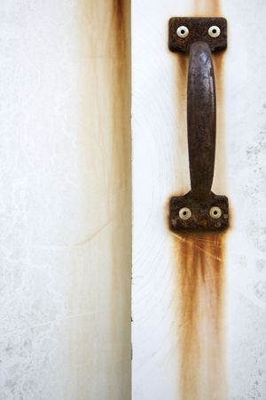 Detail of rusted door handle.